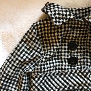 Toddlers houndstooth coat, dress, and hat set